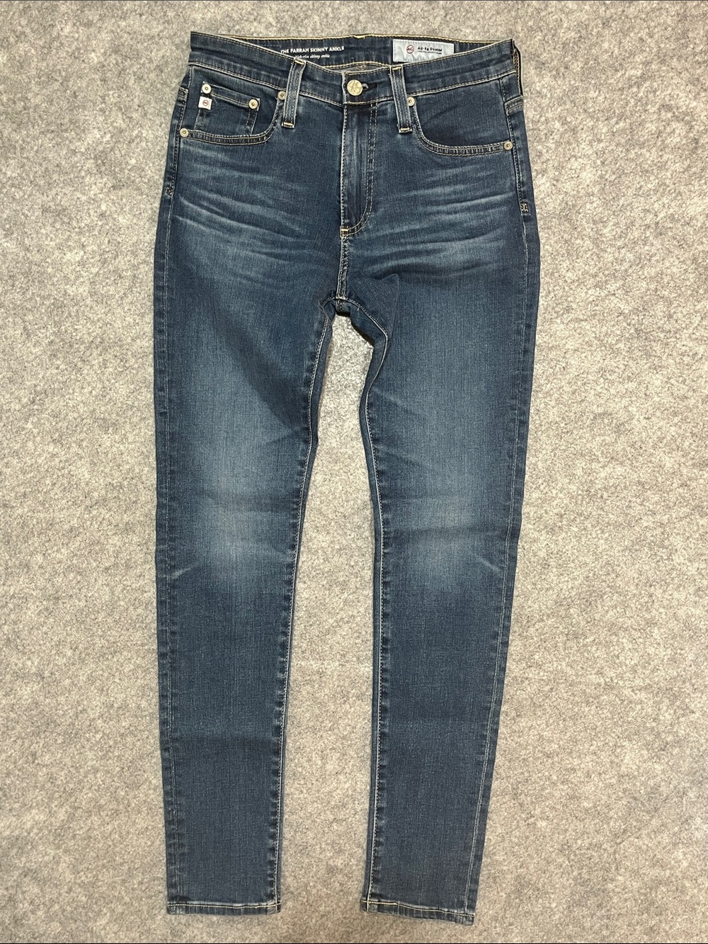 Ag Adriano Goldschmied “The Farrah Skinny Ankle” High Rise Dark Blue Jean